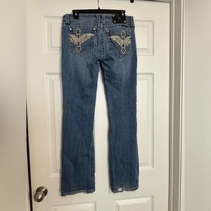 Cross wings Boot cut Miss Me jeans. Pre owned